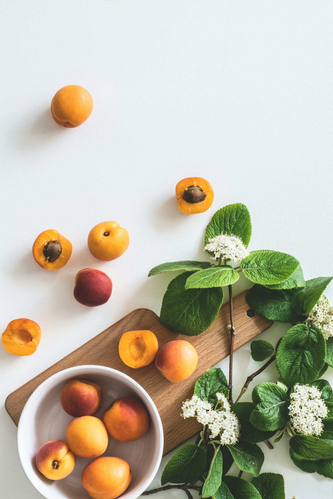 bunch-of-peach-on-white-surface-5gk0kjhbls4